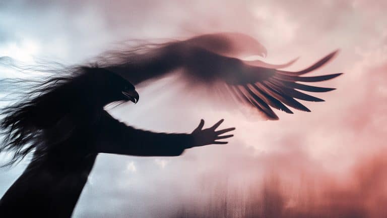 Double exposure of a silhouette of a person with an outstretched arm