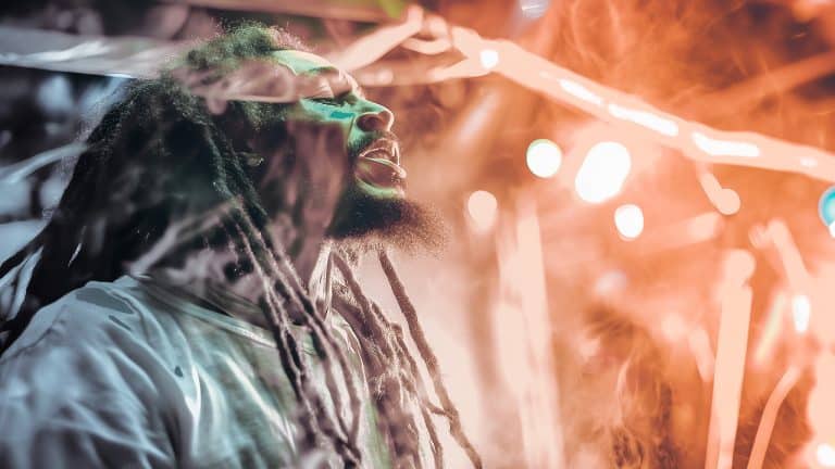 Double exposure of a person with dreadlocks singing passionately