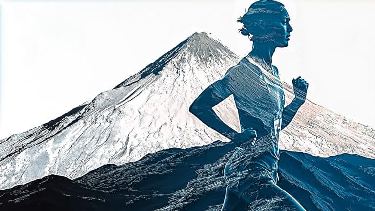 Double exposure of a silhouette of a woman running and a mountain landscape: strength and determination concept.