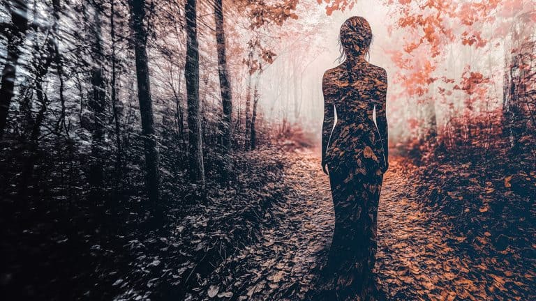 Double exposure of a silhouette of a woman covered in autumn leaves and a forest path with fallen leaves and tall trees: harmony with nature concept.