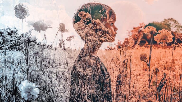 Double exposure of a child's profile and a field of yellow flowers: innocence and nature concept.