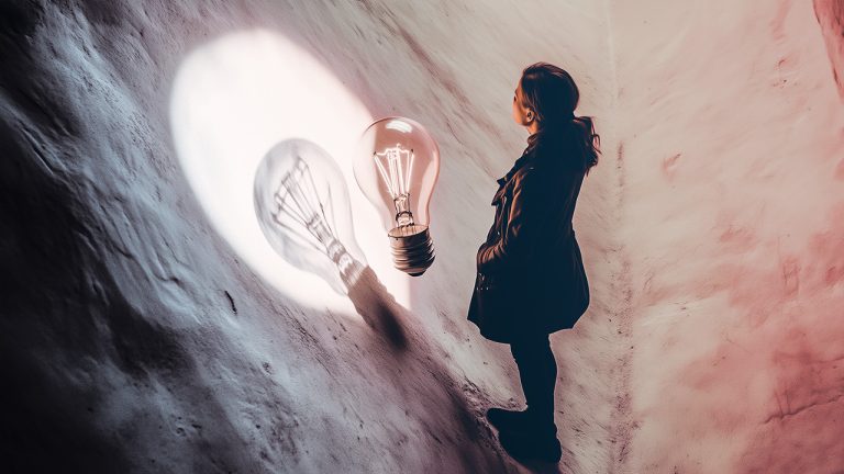 Double exposure of a woman standing in a corner and a large light bulb casting a shadow: inspiration and creativity concept.