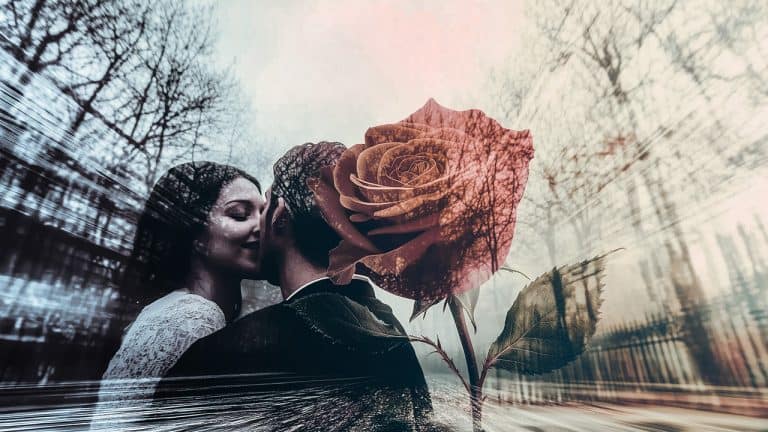 Double exposure of a couple embracing in a park with bare trees