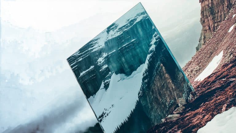 Double exposure of a snowy mountain landscape with rocky terrain