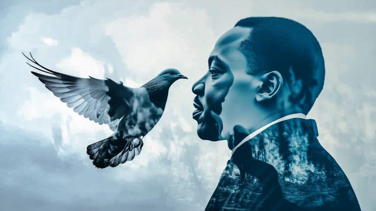 Double exposure of a man’s profile with a forest landscape within his silhouette and a bird in mid-flight against a cloudy sky: peace and unity concept.