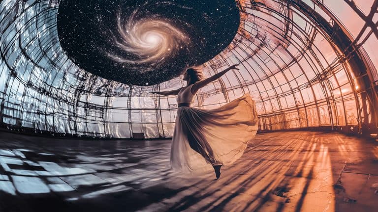 Double exposure of a woman dancing in a flowing dress inside a glass dome at sunset