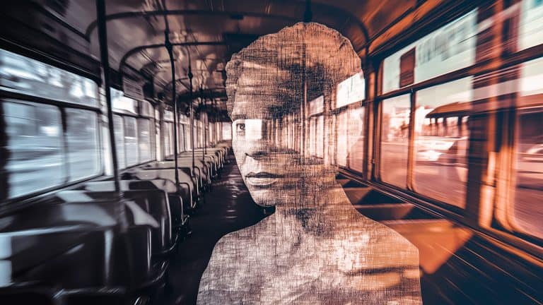 Double exposure of an empty vintage bus interior with orange seats