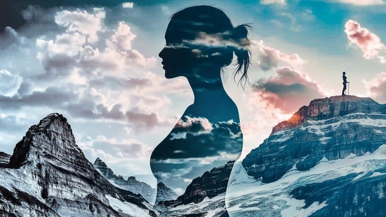 Double exposure of a woman's silhouette filled with a cloudy sky