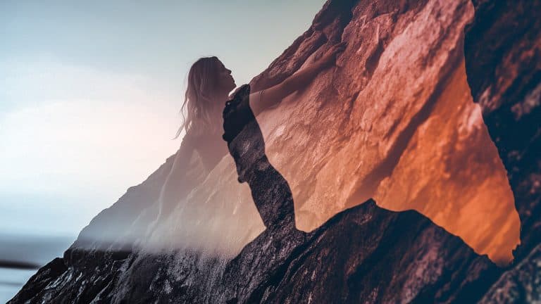 Double exposure of a woman climbing a rocky cliff and a sunset sky with warm colors: determination and serenity concept.