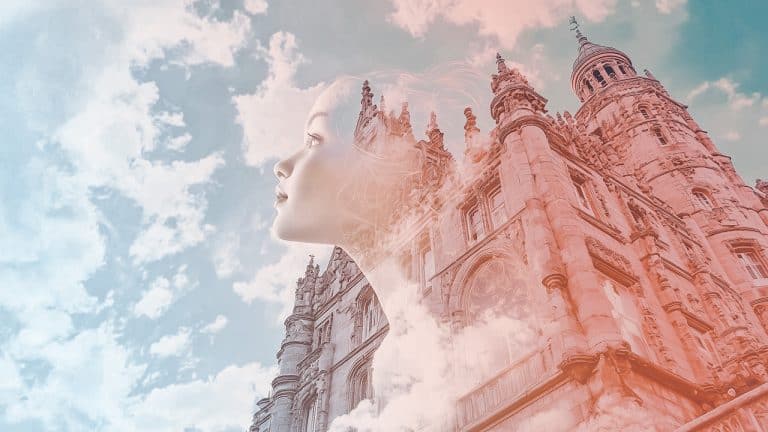 Double exposure of a woman's profile looking upward and an ornate stone building with towers under a cloudy sky: imagination and architecture concept.